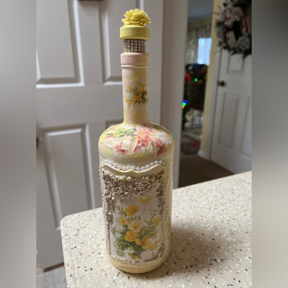Decorated glass bottle